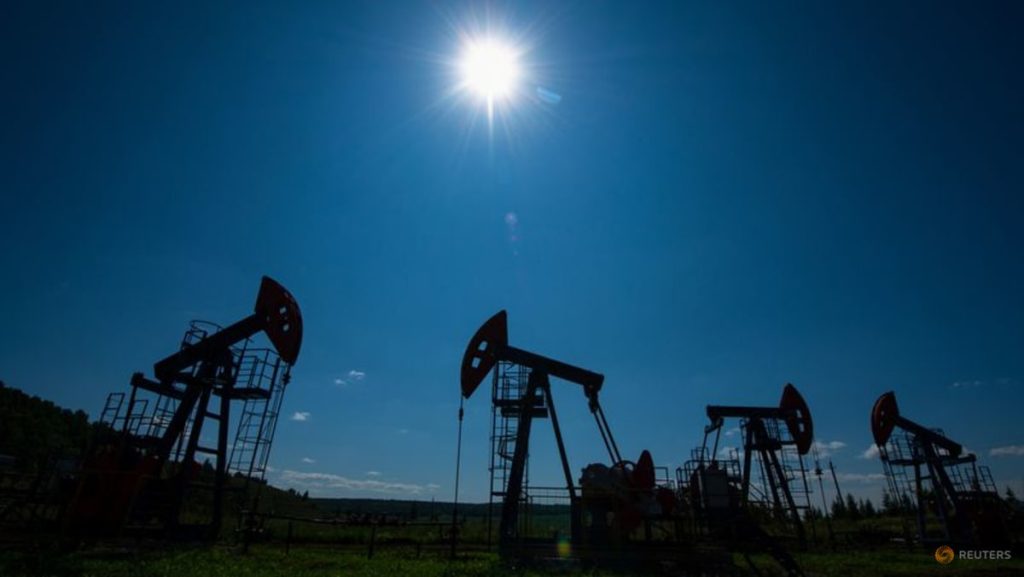 Oil prices hold steady as markets await Fed rate decision