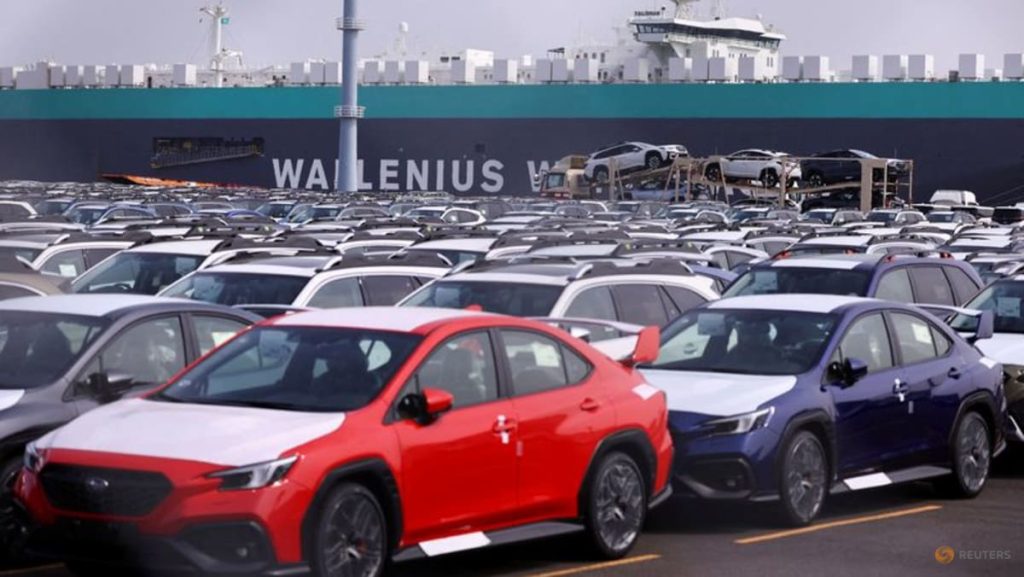 Japan says economy recovering but US tariff impact seen in auto sector