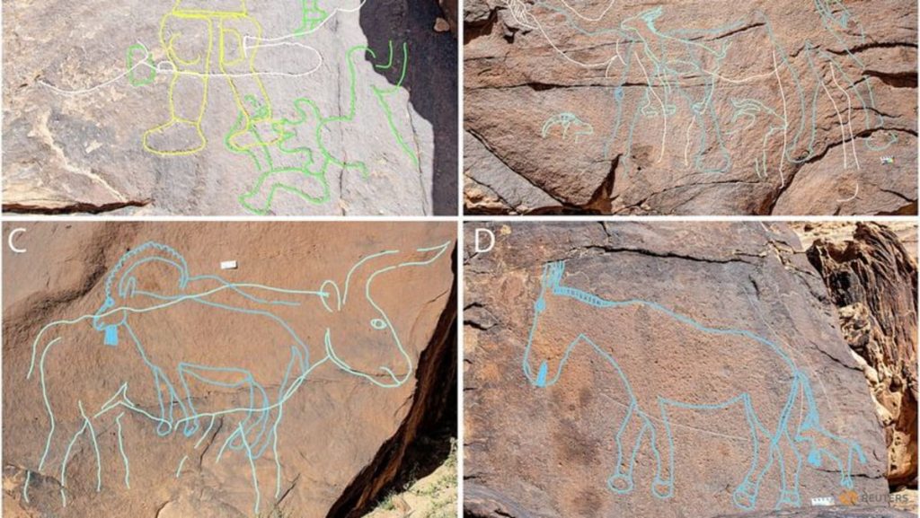 Ancient Arabian desert rock art showing camels marked water sources
