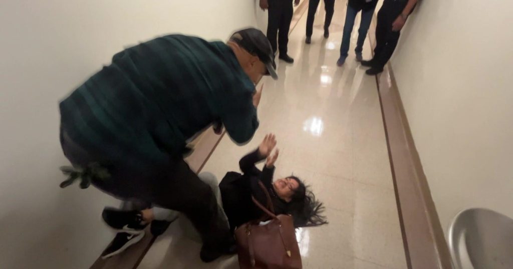 “Unacceptable”: ICE officer relieved of duties after videos show him shoving woman to the ground